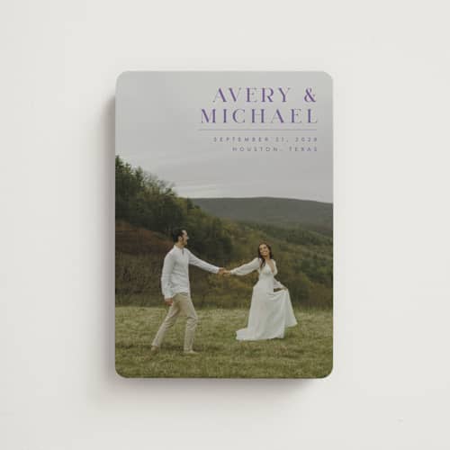 This is a lavender save the date magnets with standard by Juneau Designs called hold tight printing on magnet paper in magnet
