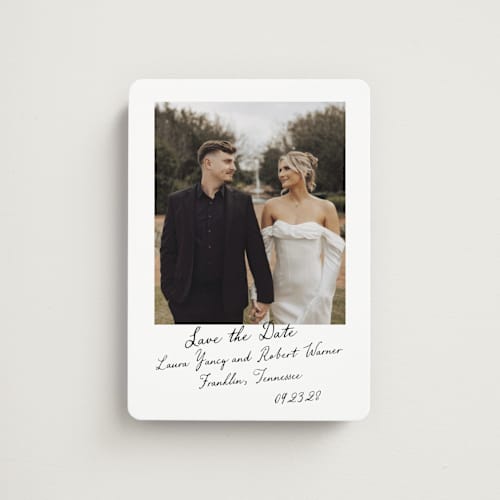 This is a snow save the date magnets with standard by Sara Hicks Malone called vintage script printing on magnet paper in magnet