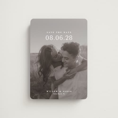 This is a moonstone save the date magnets with standard by Lucrecia Caporale called classic big date printing on magnet paper in magnet