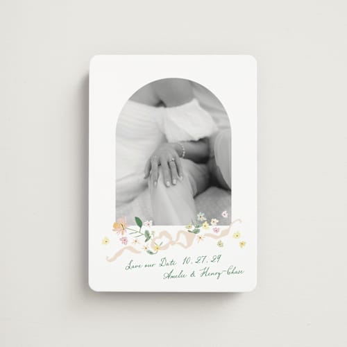 This is a spring save the date magnets with standard by Phrosné Barwood called spring draped garland printing on magnet paper in magnet