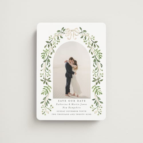 This is a sage save the date magnets with standard by Sarah Knight called greenery crest printing on magnet paper in magnet