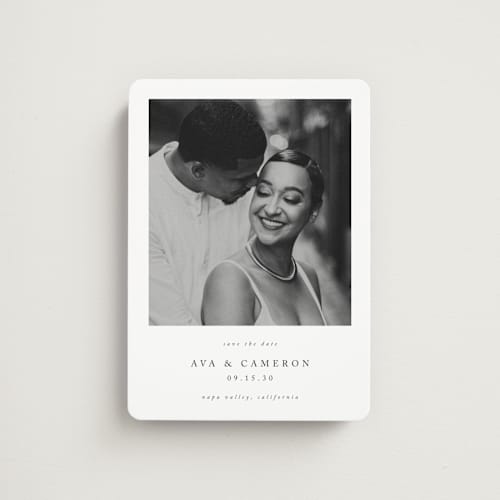 This is a onyx save the date magnets with standard by Jennifer Postorino called simple elegance printing on magnet paper in magnet