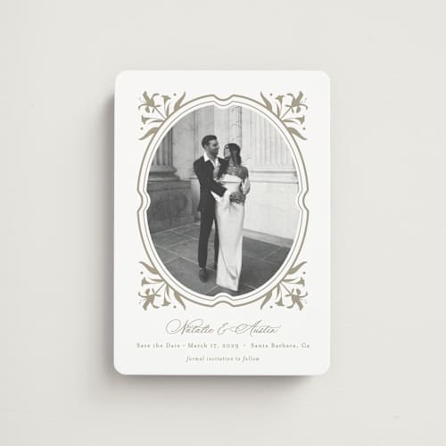 This is a paris rain save the date magnets with standard by Jennifer Postorino called calia printing on magnet paper in magnet