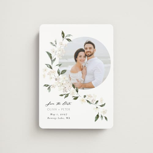 This is a porcelain save the date magnets with standard by Itsy Belle Studio called sweeping vine printing on magnet paper in magnet