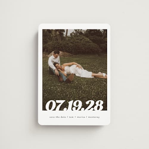 This is a pearl save the date magnets with standard by Christie Garcia called sidele printing on magnet paper in magnet