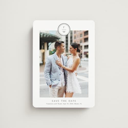 This is a cotton save the date magnets with standard by Stacey Meacham called circle monogram printing on magnet paper in magnet