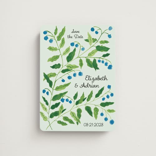 This is a mint save the date magnets with standard by Studio Suku called lily of the valley printing on magnet paper in magnet