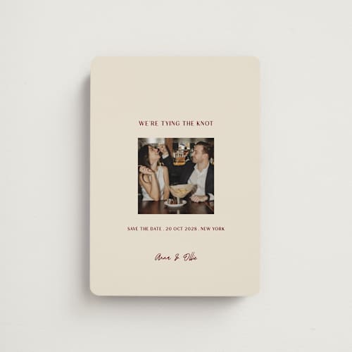This is a burgundy save the date magnets with standard by Ani Somi called center cut printing on magnet paper in magnet