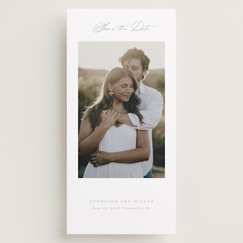 This is a dusty blue save the date with standard by Stacey Meacham called modern air printing on recycled smooth signature in tall