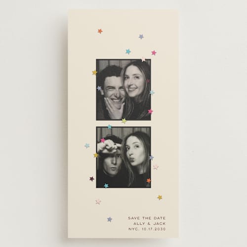 This is a cream save the date with standard by Ellen Schlegelmilch called scrapbook stars printing on recycled smooth signature in tall