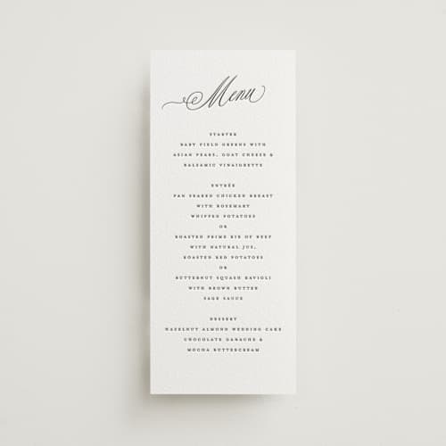 This is a soft black menu cards with letterpress by Susan Zinader called romantic script printing on white cotton in 4x9