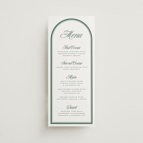 This is a racing green menu cards with letterpress by Kelly Watkins called archer printing on white cotton in 4x9