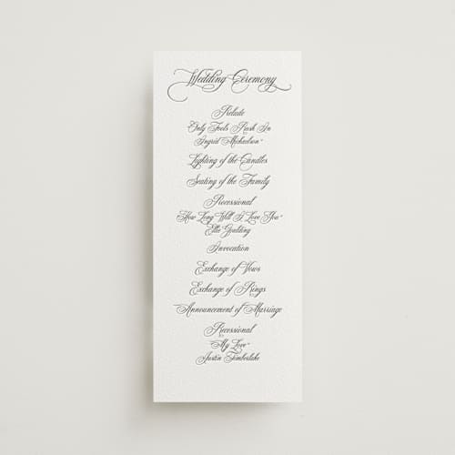 This is a soft black unique wedding programs with letterpress by Benita Crandall called palazzo printing on white cotton in 4x9