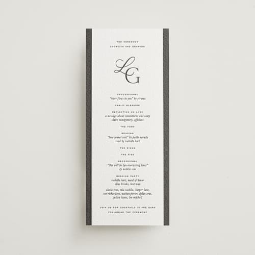 This is a soft black unique wedding programs with letterpress by Kamala Nahas called grayson printing on white cotton in 4x9