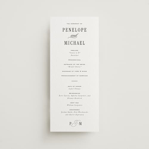 This is a soft black unique wedding programs with letterpress by Leah Bisch called outlined printing on luxe white cotton in 4x9