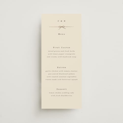 This is a ivory menu cards with foil pressed by Baumbirdy called bow tie printing on signature in 4x9