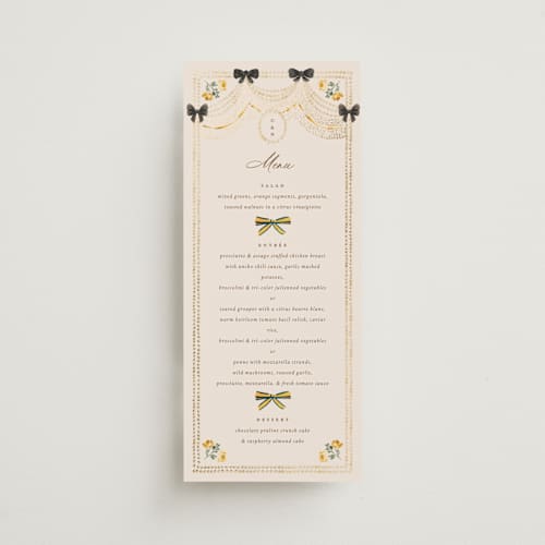This is a golden menu cards with foil pressed by Claudia Orengo called tuileries printing on signature in 4x9
