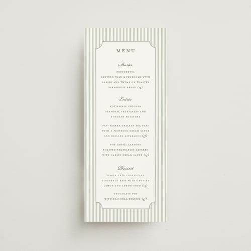 This is a sage menu cards with standard by Sarah Knight called greenery crest printing on signature in 4x9
