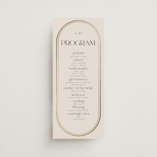 This is a sandstone unique wedding programs with foil pressed by Lori Wemple called oval printing on signature in 4x9