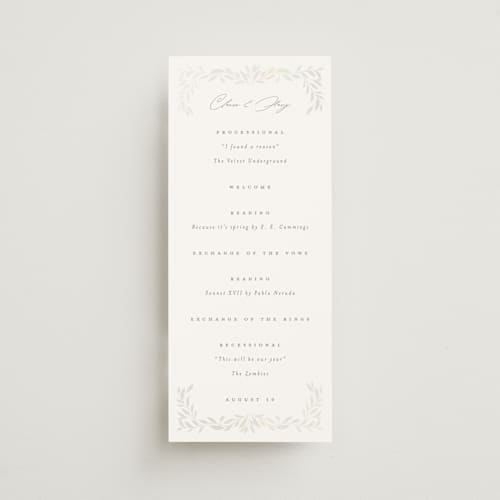 This is a cloud unique wedding programs with foil pressed by Ana Sharpe called clarity printing on signature in 4x9