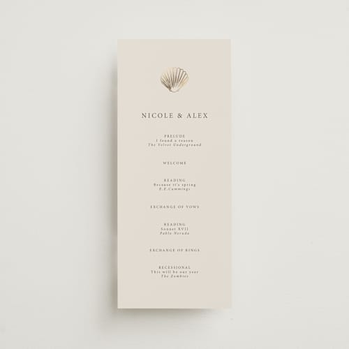 This is a sand unique wedding programs with foil pressed by Hannah Bowman called simple seashell printing on signature in 4x9
