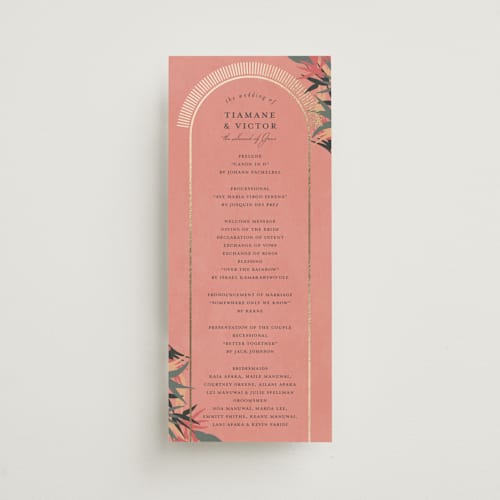 This is a coral unique wedding programs with foil pressed by Julie Hebert called birds of paradise printing on signature in 4x9