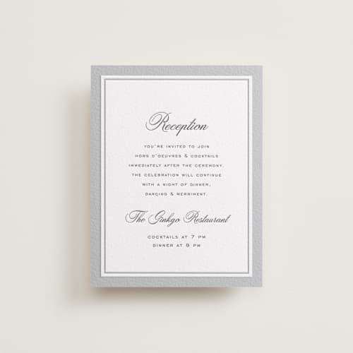 This is a soft black letterpress wedding invitations with letterpress by chocomocacino called krytharaki printing on white cotton in standard