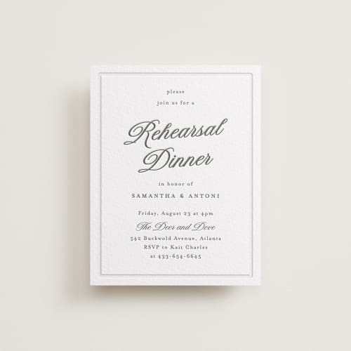 This is a soft black enclosure cards with letterpress by Nicole Walsh called tux printing on white cotton in standard