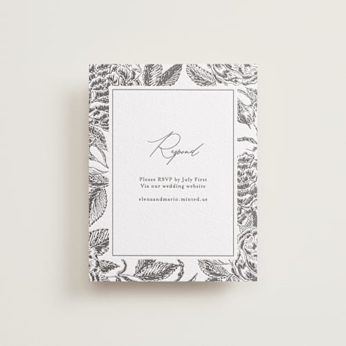 This is a soft black rsvp cards with letterpress by Chris Griffith called etchings of roses printing on white cotton in standard