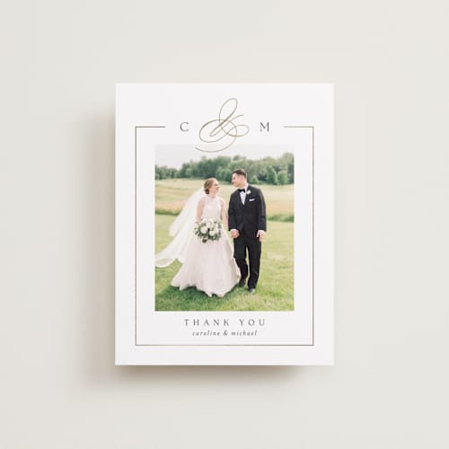 This is a silk wedding thank you cards with foil pressed by Kelly Schmidt called framed monogram printing on recycled smooth signature in standard