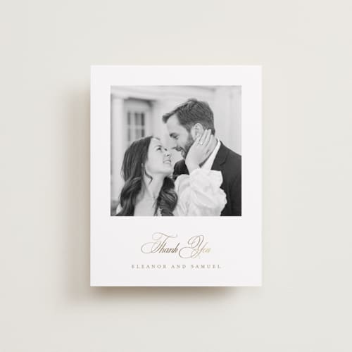This is a ivory wedding thank you cards with foil pressed by Mansi Verma called gold crest printing on recycled smooth signature in standard