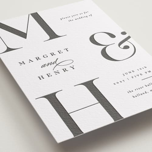 This is a soft black letterpress wedding invitations with letterpress by Pixel and Hank called trio printing on white cotton in standard