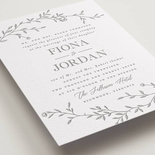 This is a granite letterpress wedding invitations with letterpress by Vera Lim called jasmine printing on white cotton in standard