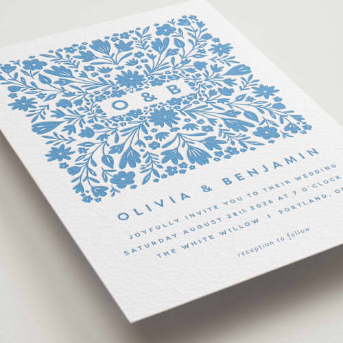 This is a marine blue letterpress wedding invitations with letterpress by Stephanie Hawkes called floral stamp printing on white cotton in standard