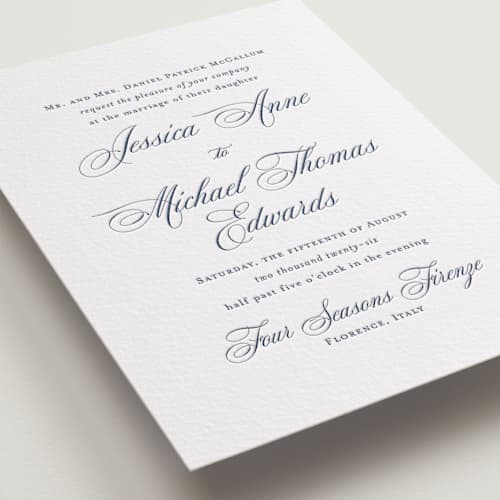 This is a blueberry letterpress wedding invitations with letterpress by Jennifer Postorino called empire printing on white cotton in standard