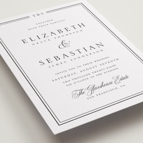 This is a soft black letterpress wedding invitations with letterpress by Nicole Walsh called classic frame printing on white cotton in standard