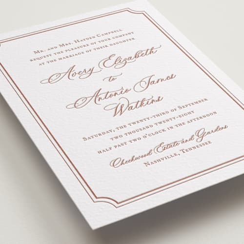 This is a cinnamon letterpress wedding invitations with letterpress by Jennifer Postorino called avery printing on white cotton in standard