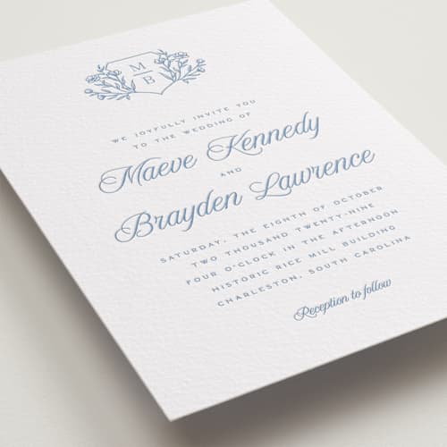 This is a pacific blue letterpress wedding invitations with letterpress by Hooray Creative called blue crest printing on white cotton in standard