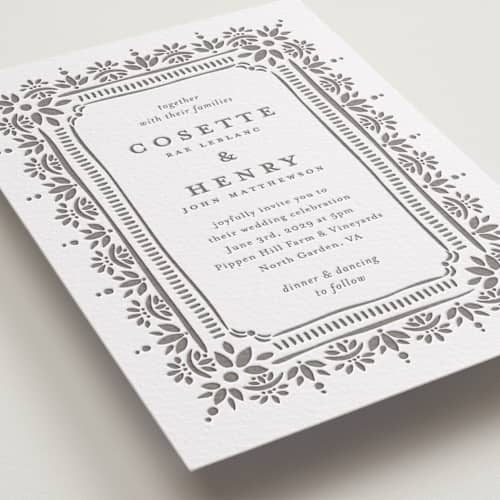 This is a graphite letterpress wedding invitations with letterpress by Melanie Kosuge called cosette printing on white cotton in standard