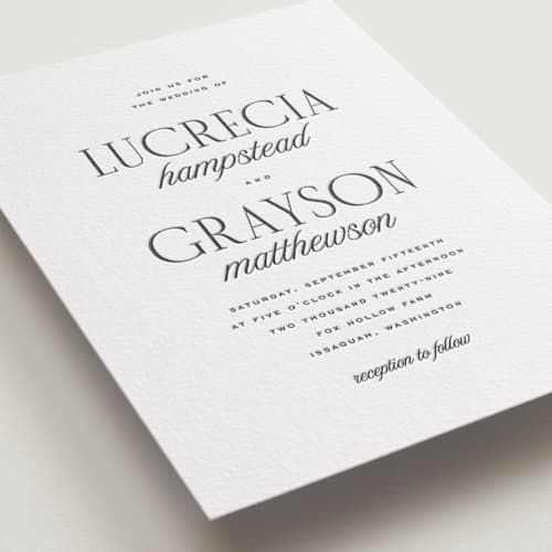 This is a soft black letterpress wedding invitations with letterpress by Kamala Nahas called grayson printing on white cotton in standard