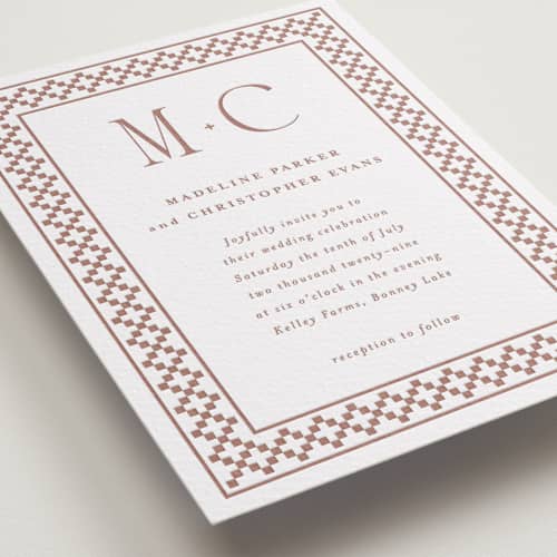 This is a cinnamon letterpress wedding invitations with letterpress by Angela Garrick called parker printing on white cotton in standard