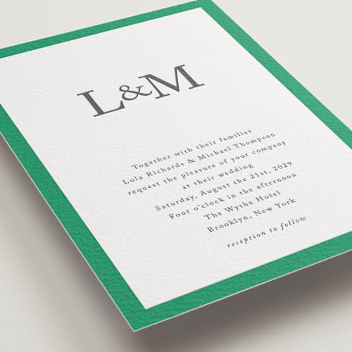 This is a soft black letterpress wedding invitations with letterpress by mo kelley called classic initials printing on white cotton in standard