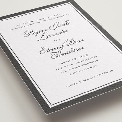 This is a soft black letterpress wedding invitations with letterpress by chocomocacino called krytharaki printing on white cotton in standard