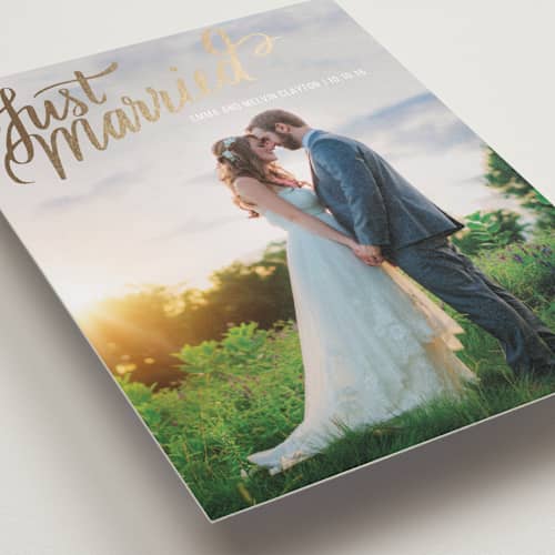 This is a gold wedding announcements with foil pressed by Rebecca Daublin called married script printing on recycled smooth signature in standard
