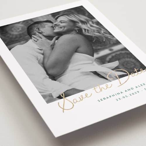 This is a garden green foil stamped save the date cards with foil pressed by Lucrecia Caporale called coastal bloom printing on recycled smooth signature in standard