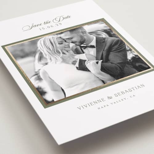 This is a sage foil stamped save the date cards with foil pressed by Lucrecia Caporale called country elegance printing on recycled smooth signature in standard