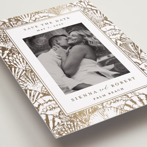 This is a pearl foil stamped save the date cards with foil pressed by Maria Alou called by the seashore printing on recycled smooth signature in standard