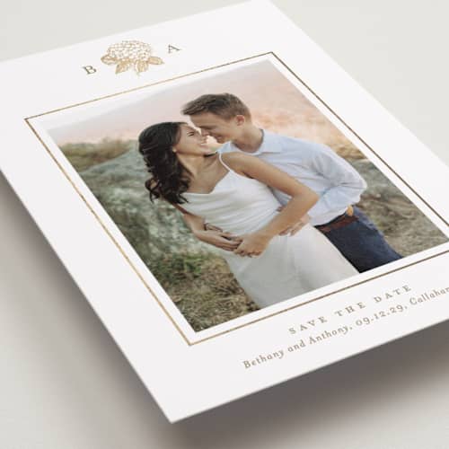 This is a cotton foil stamped save the date cards with foil pressed by Stacey Meacham called hydrangea bloom printing on recycled smooth signature in standard