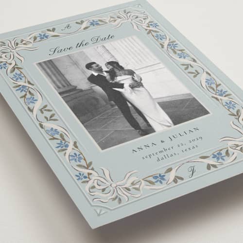 This is a spearmint foil stamped save the date cards with foil pressed by Ana de Sousa called romantic elegance printing on recycled smooth signature in standard