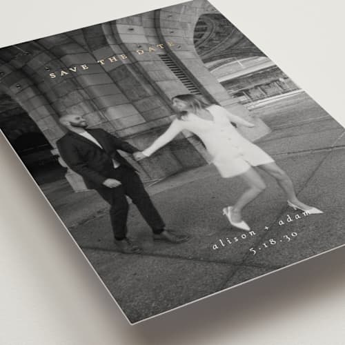 This is a cotton foil stamped save the date cards with foil pressed by Amy Kross called veneer printing on recycled smooth signature in standard